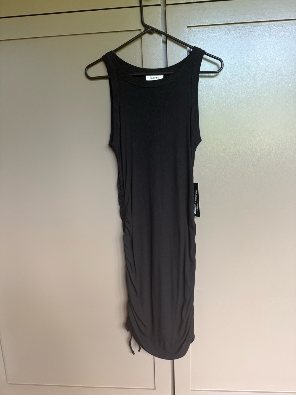 Korye Black Sleeveless Ruched Tank Dress
